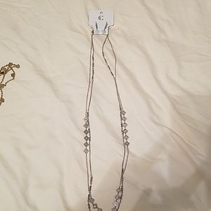 Silver necklace and earring set